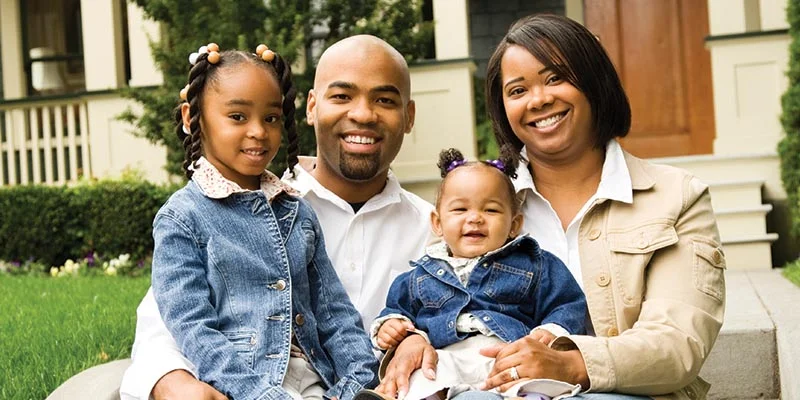 Family On House Steps | Decorating Ideas | Powell, Wyoming